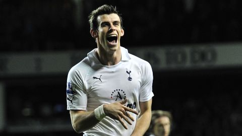 Gareth Bale celebrates the first of his two goals as Tottenham beat QPR 3-1 to go fifth in the Premier League.