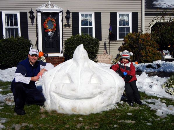 iReport contributors the Montecalvo family of Attleboro, Massachusetts, made a pumpkin out of snow as an additional Halloween decoration for their home on Sunday, October 30.