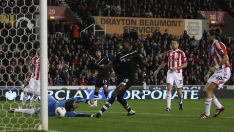 Newcastle striker Demba Ba scores the second goal of his hat-trick in Monday's 3-1 victory over Stoke.