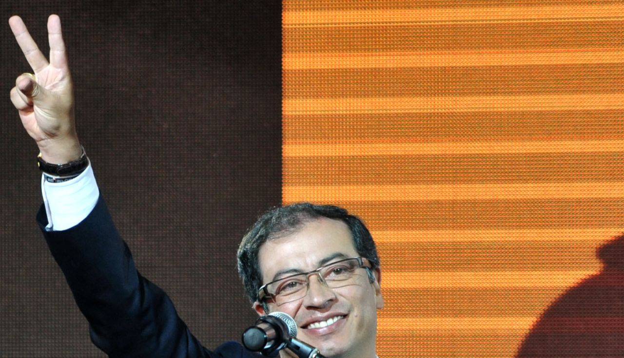 The leftist Gustavo Petro celebrates after being elected new mayor of Bogota, Colombia, on Sunday.