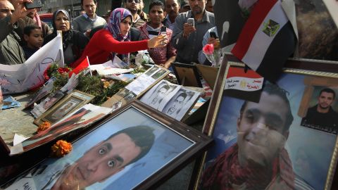  Egyptians pay their respects in Tahrir Square in February at a memorial for those killed by police during the uprising.