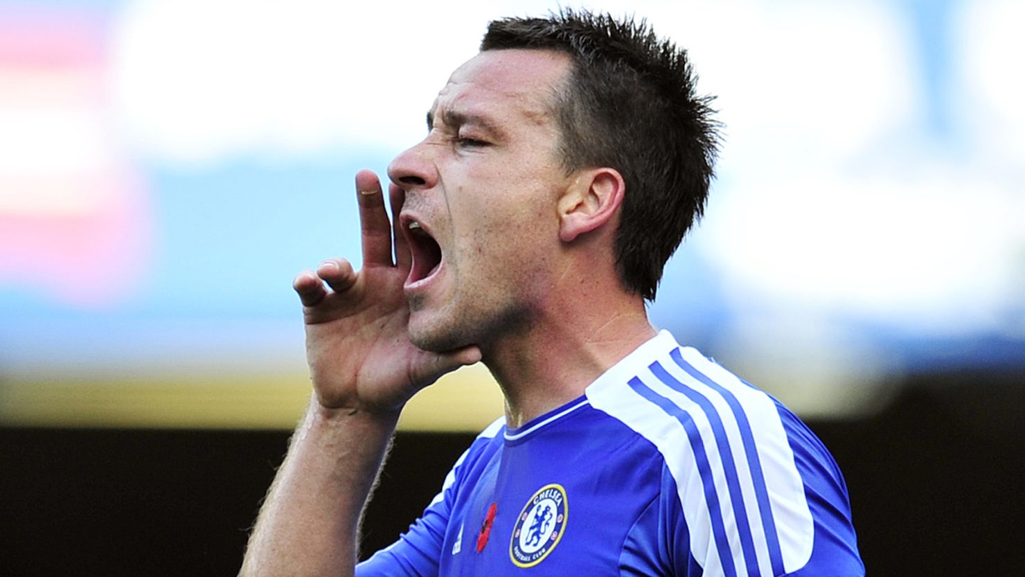Chelsea captain John Terry shouts instructions during an English Premier League match against Arsenal on Saturday.