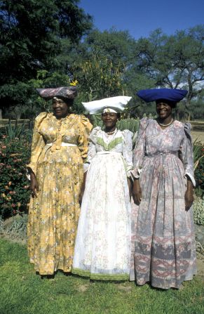 The long Victorian-period dresses are worn with numerous petticoats to add fullness to their skirts. 