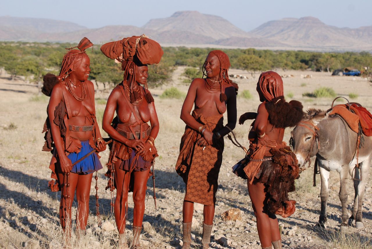 The Herero used to belong to the same group as the Himba (pictured) but German missionaries influenced their style of clothing. The Herero worked for the Germans and were forced to cover up to fit in with their modest Victorian attitudes. 