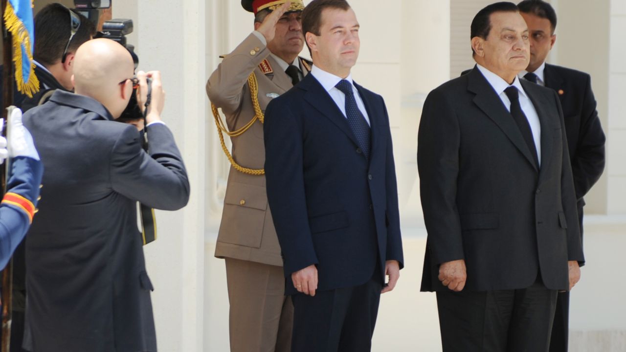 In action: Ahmed Mourad takes a photograph of former Egyptian president Hosni Mubarak