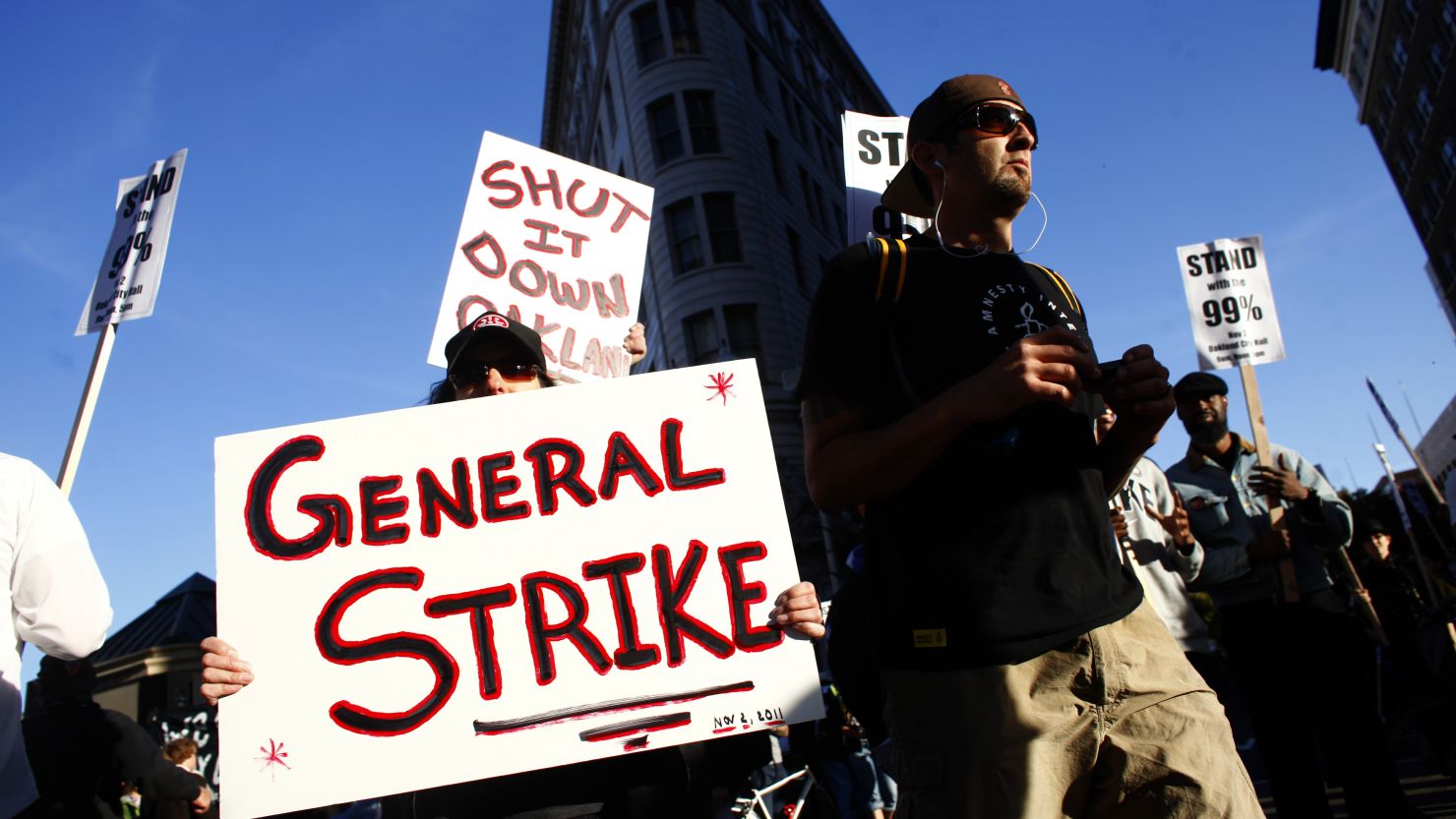 Occupy protesters gather Wednesday in Oakland as they plan for a general strike.