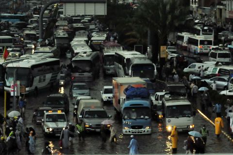 Traffic sit bumper-to-bumper in the flooded streets of Mecca during heavy rainfall in 2010. The newly-released "Green Guide to the Hajj" hopes to encourage pilgrims to look after the environment.