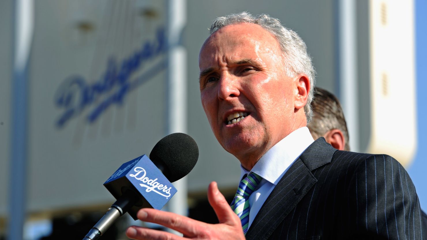 Los Angeles Dodgers owner Frank McCourt, who had been involved in a bitter divorce battle, has agreed to sell the team.