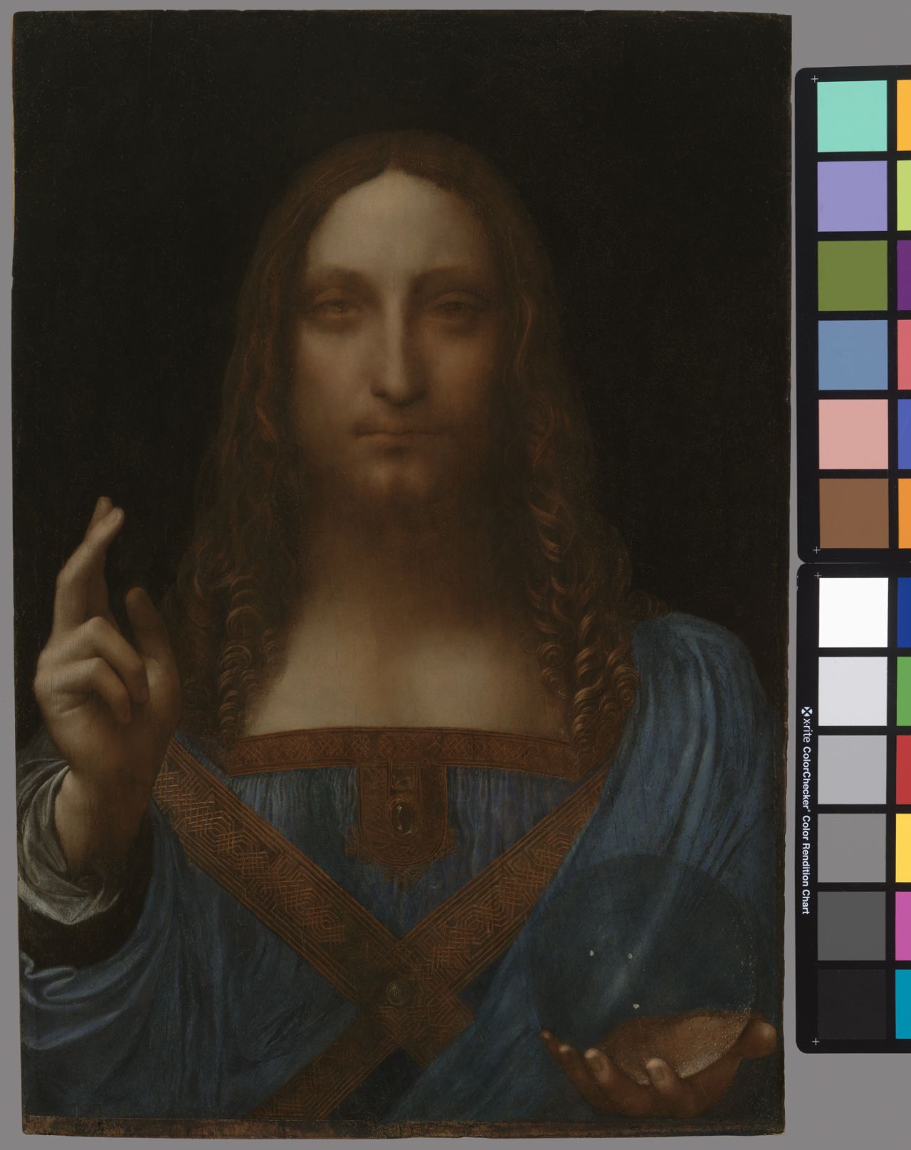 The restoration work to the "Salvator Mundi" involed cleaning off layers of varnish and over-paint, repairing a crack in the wood panel and re-touching damaged areas of the painting. 