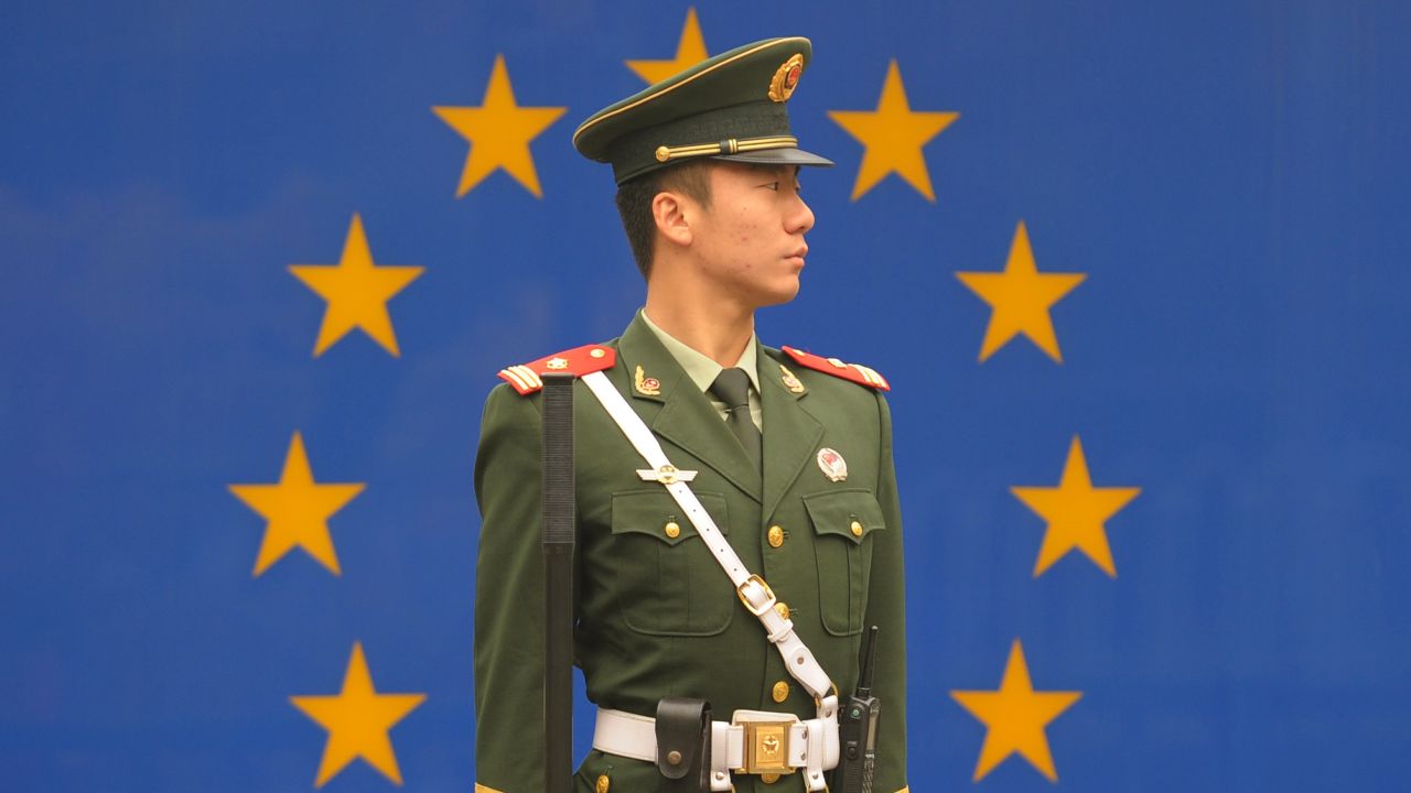 A Chinese paramilitary policeman stands guard outside the European Union Delegation in Beijing on October 30.
