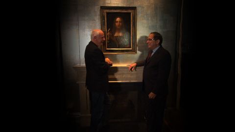 CNN presenter Nick Glass with Robert Simon, the scholar and dealer who was asked to study the painting in 2005 and eventually discovered its true identity, in front of "Salvator Mundi."