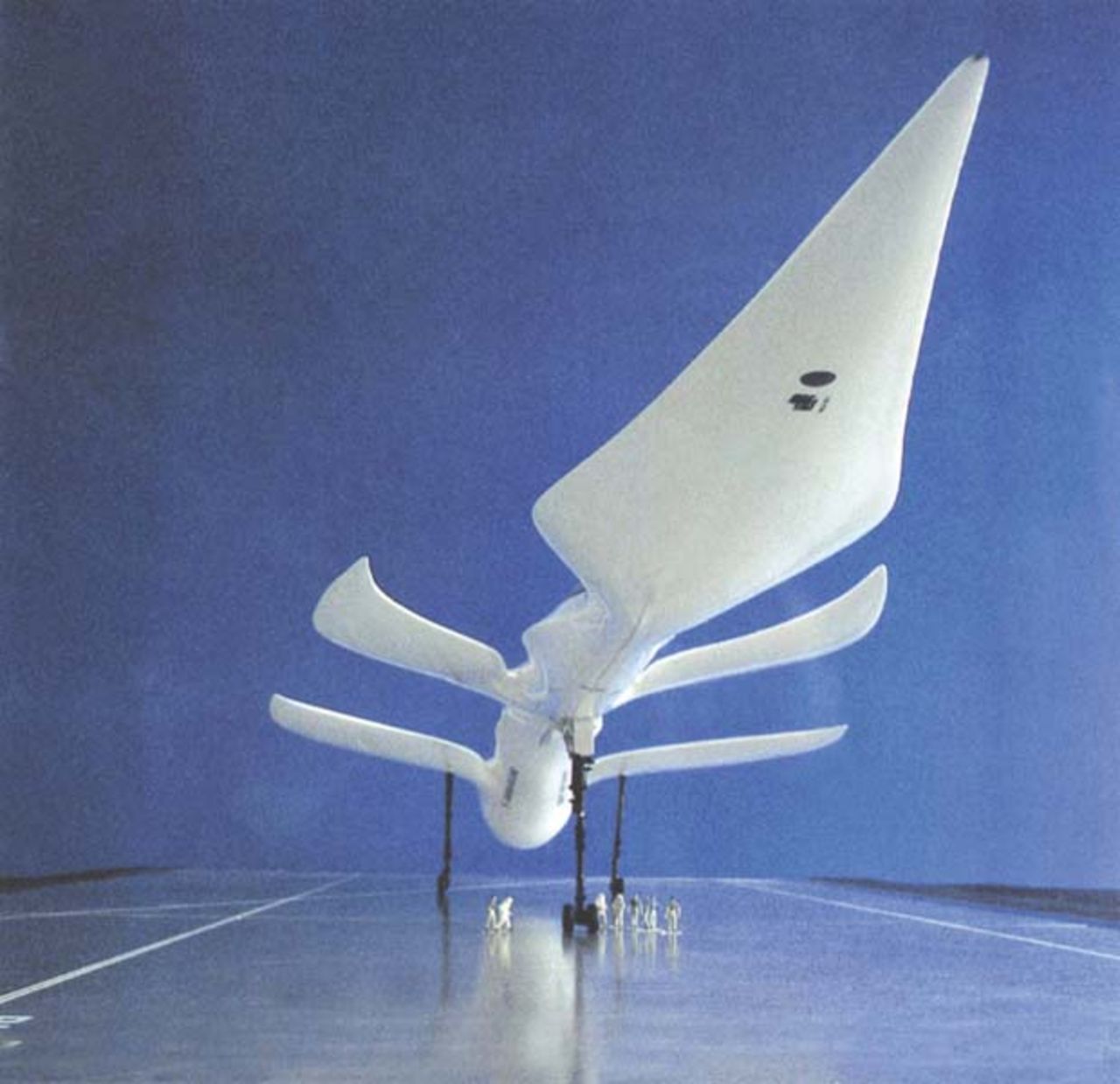 Study for a Mach five passenger aircraft, 1983. The huge engine sucks in air through the perforated outer edge of the aircraft body. The four-winged supersonic plane was meant to cover the distance between Tokyo and London in just three hours.