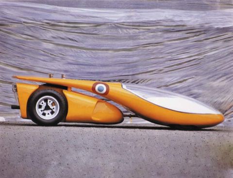 Life-sized model of a two-part hybrid car, 1970. The engine and cam shaft are taken from a Lamborghini Miura. The separate passenger cabin is designed like the cockpit of a glider.