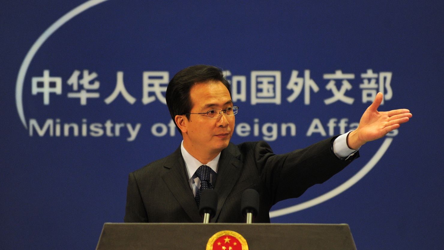 China's Ministry of Foreign Affairs spokesman Hong Lei gestures at a press briefing in Beijing on November 30, 2010. 