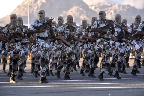 Saudi Interior Ministry special forces perform before Interior Minister and Crown Prince Nayef bin Abdelaziz (unseen) during a special parade on the eve of Hajj season in Mecca on Tuesday, November 1.