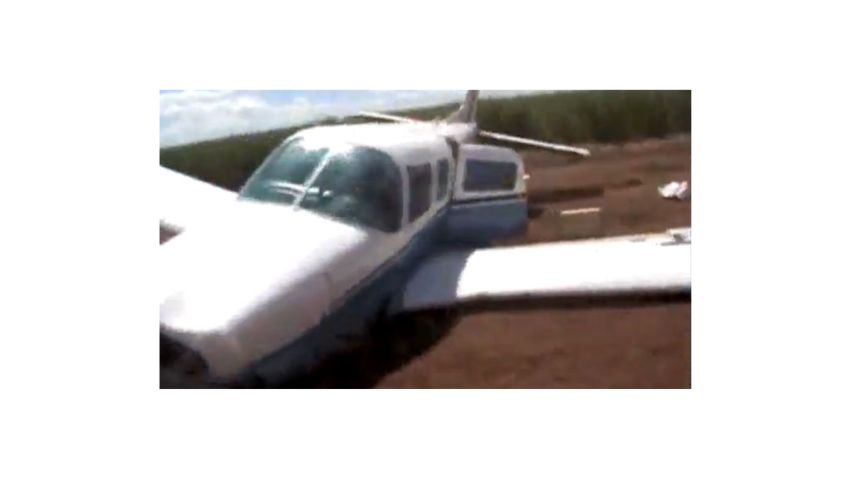 Brazil police crash car into airplane