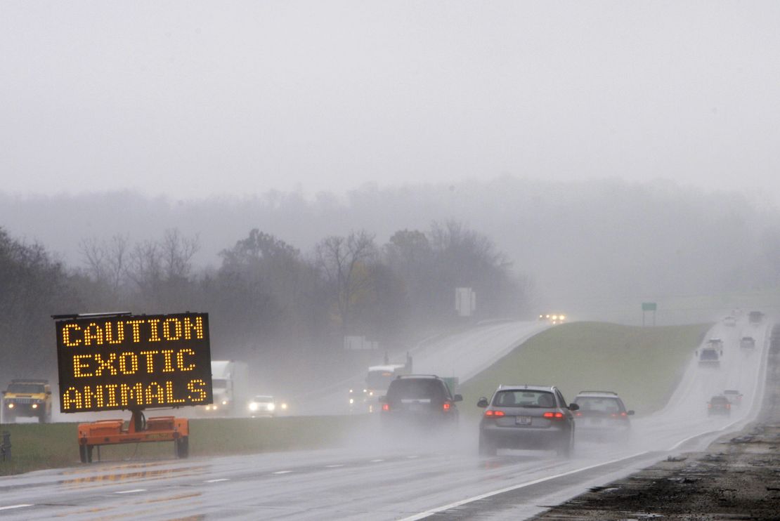 A sign warns passing motorists about exotic animals on the loose in Zanesville, Ohio.  