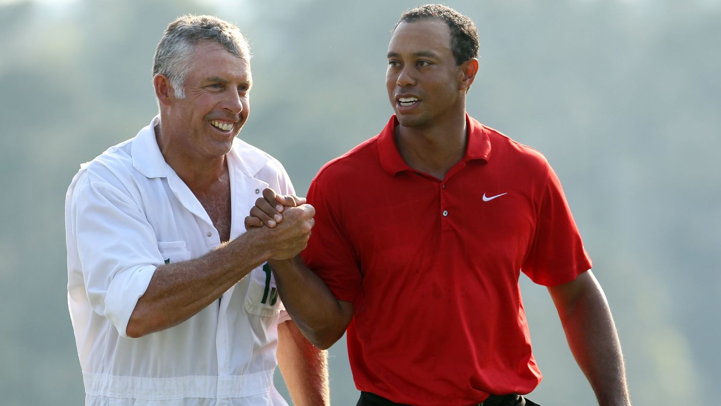 Tiger Woods (right) with caddie Steve Williams during the 2011 Masters on April 10, 2011 in Augusta, Georgia.