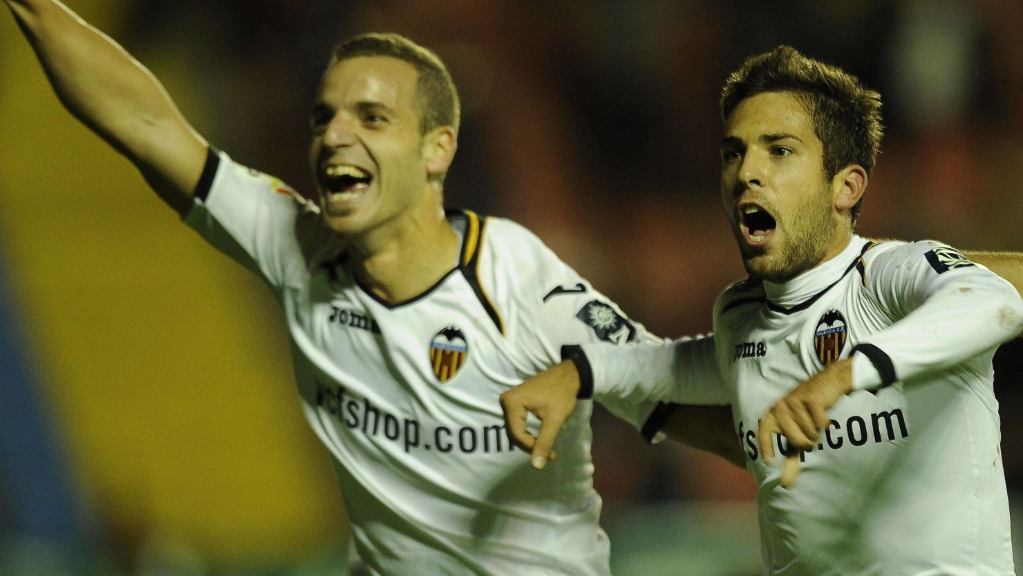 Roberto Soldado, left, and Jordi Alba celebrate Valencia's opening goal against Levante at the Ciudad de Valencia.