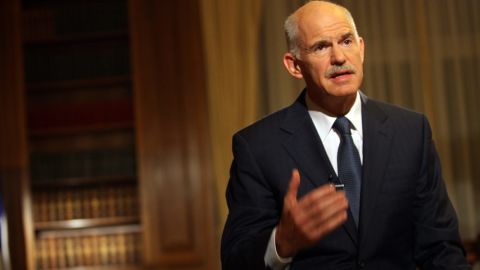 Prime Minister George Papandreou began steps to form a coalition government after narrowly winniing a vote of  confidence.