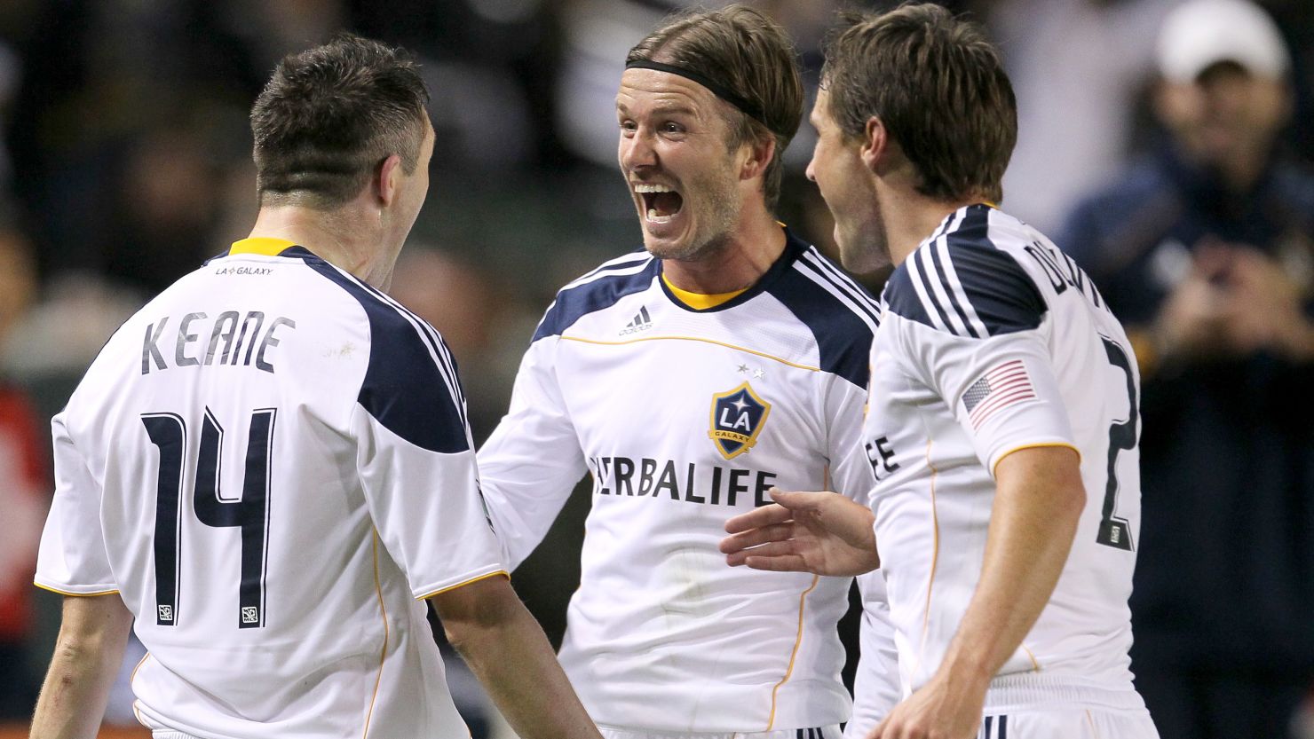 David Beckham (center) celebrates with Robbie Keane (left) during Los Angeles Galaxy's 3-1 win on Sunday.