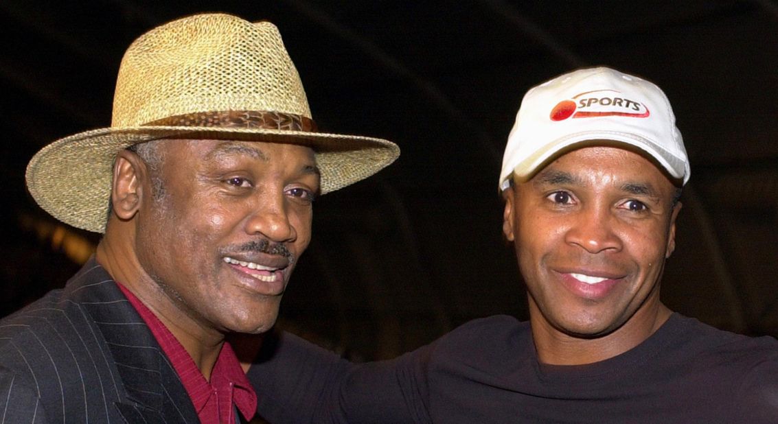 Frazier and Sugar Ray Leonard meet before Frazier's daughter Jacqui Frazier-Lyde fought Laila Ali during the women's super middleweight fight in 2001 in New York. <br />