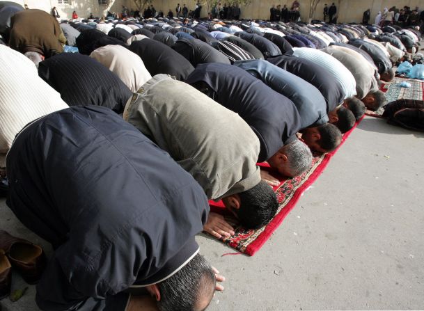 Muslim men bow to pray in a mosque in Baku. 93% of Azerbaijan's population is muslim according to the country's government.