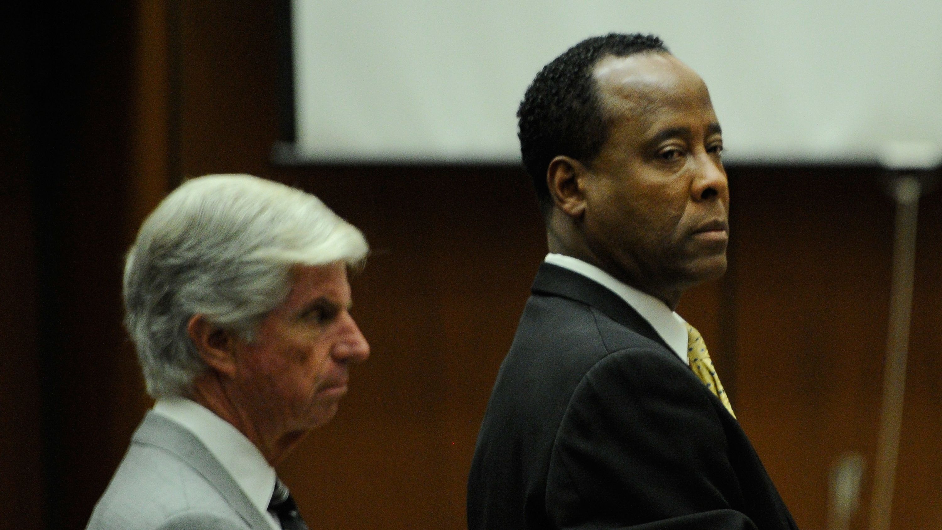  Dr. Conrad Murray, right, at his trial. He was convicted of involuntary manslaughter in the death of Michael Jackson .