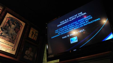 The new Emergency Alert System test shows on a TV in Washington, D.C., on Wednesday.