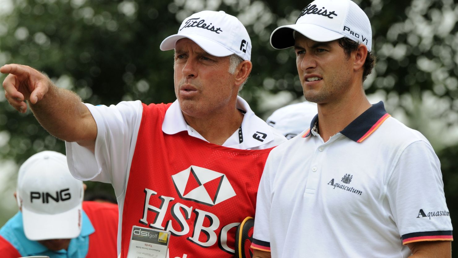 Steve Williams (left) started caddying for Australian golfer Adam Scott in July.