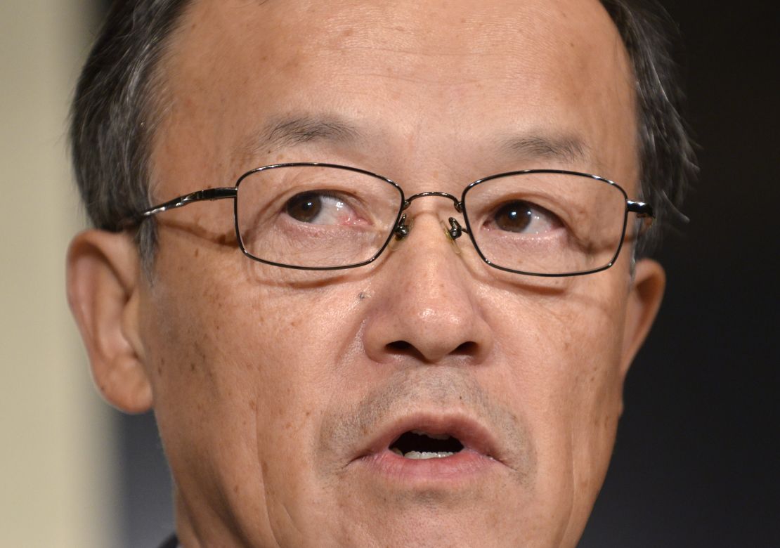 Olympus president Shuichi Takayama at  a November 8 press conference admitting a cover-up for the first time.