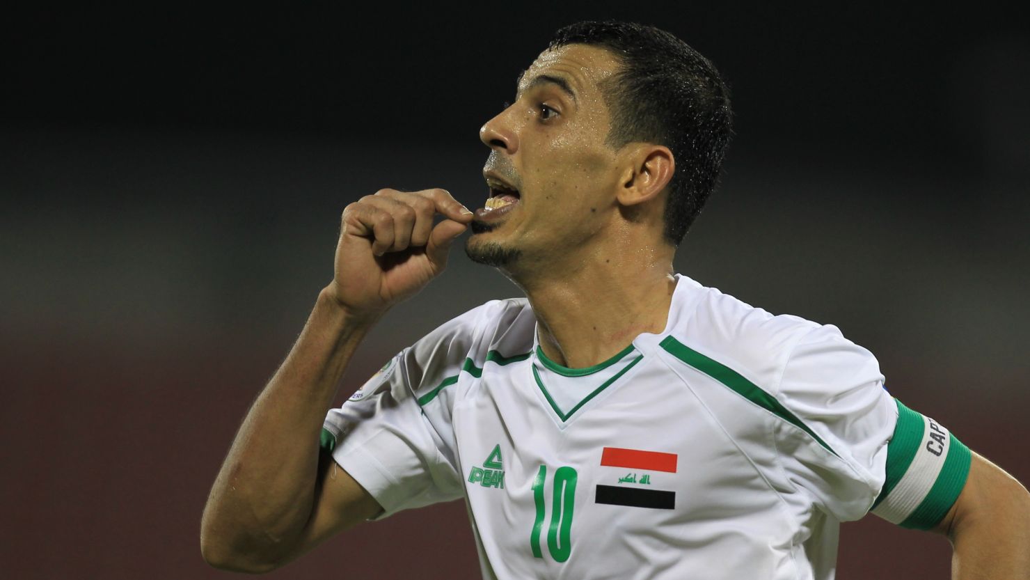 Younis Mahmoud celebrates the only goal of the match as Iraq beat China 1-0 in World Cup qualifying