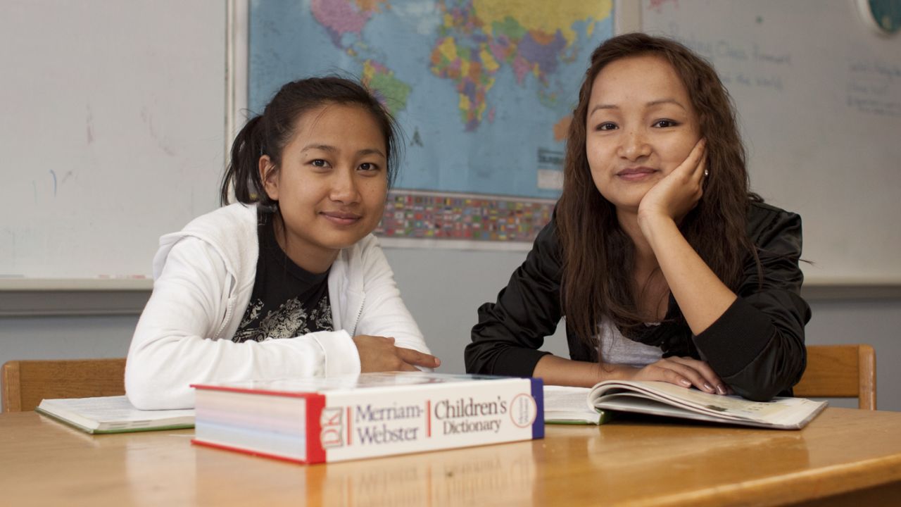Sisters Rita, left, and Melody, right, left their parents behind when they came to the U.S. from Myanmar. 