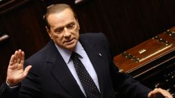 Italian Prime Minister Silvio berlusconi reacts during a session at the parliament to adopt measures he promised to the European Union on November 12, 2011 in Rome. Prime Minister Silvio Berlusconi was set to resign later in the day after dominating Italian political life for 17 years, as lawmakers prepared to give final approval to a package of key economic reforms. AFP PHOTO / FILIPPO MONTEFORTE (Photo credit should read FILIPPO MONTEFORTE/AFP/Getty Images) 