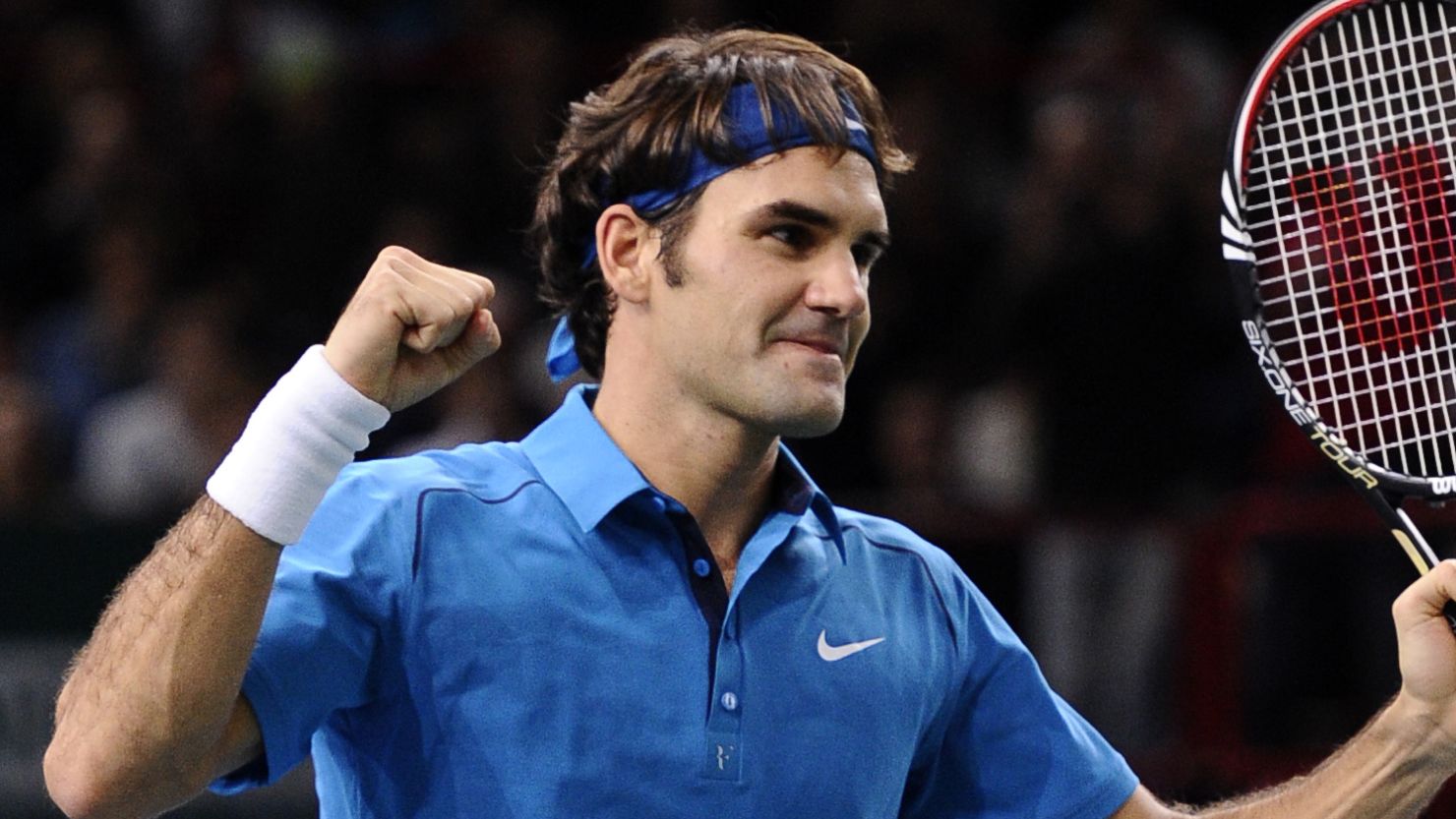Roger Federer celebrates his straight sets win over Tomas Berdych in Paris