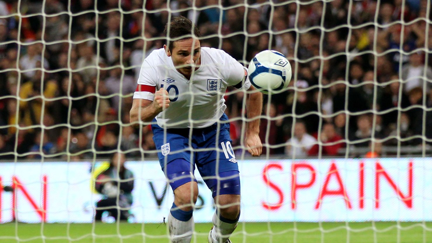Frank Lampard stoops to head the only goal of the game for England at Wembley
