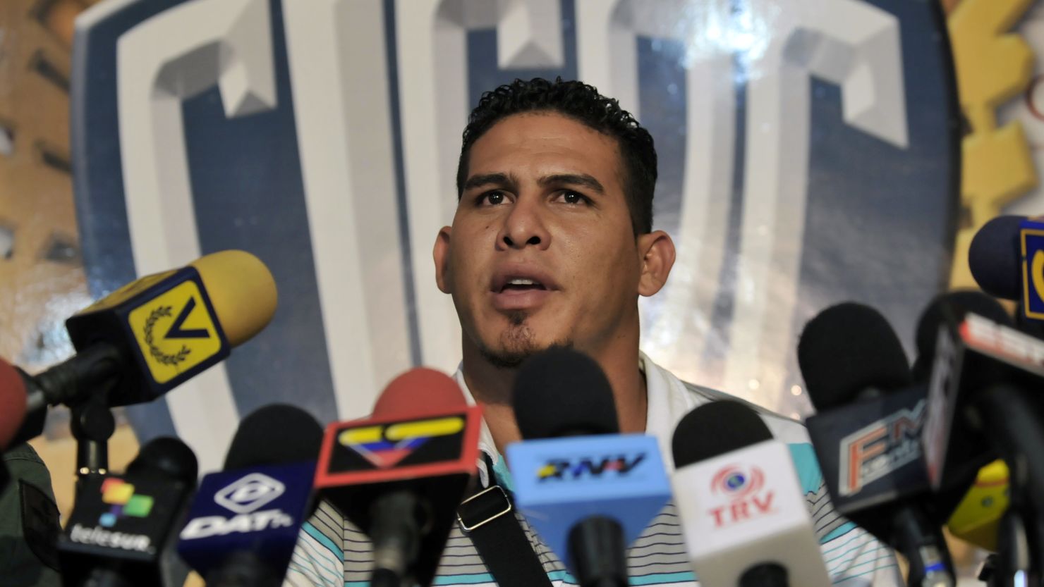 Major league baseball player Wilson Ramos, speaks during a press conference in Valencia, Venezuela after his rescue. 