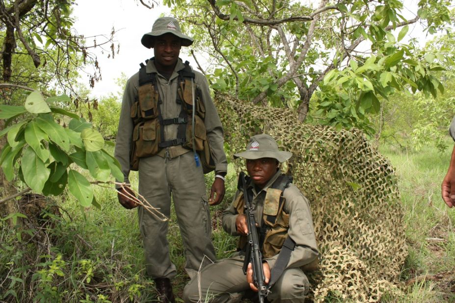 The South African military and heavily-armed private security forces patrol Kruger National Park looking for poachers.