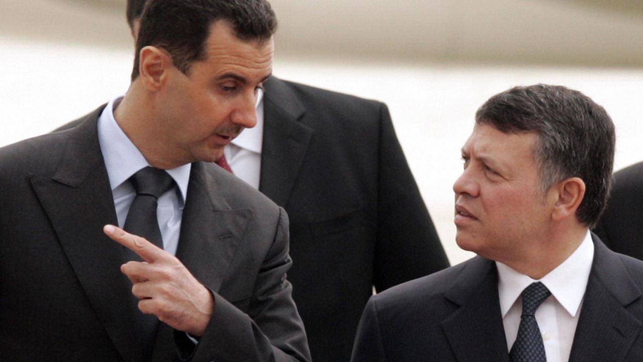 Jordan's King Abdullah, right, welcomes Syrian President Bashar al-Assad upon his arrival for a visit to Amman in 2009.