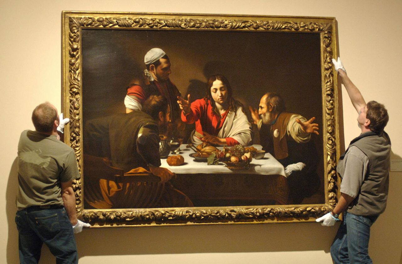 Caravaggio's painting, "The Supper at Emmaus," contains subtle clues pointing to the true identity of the beardless man at the head of the table. 