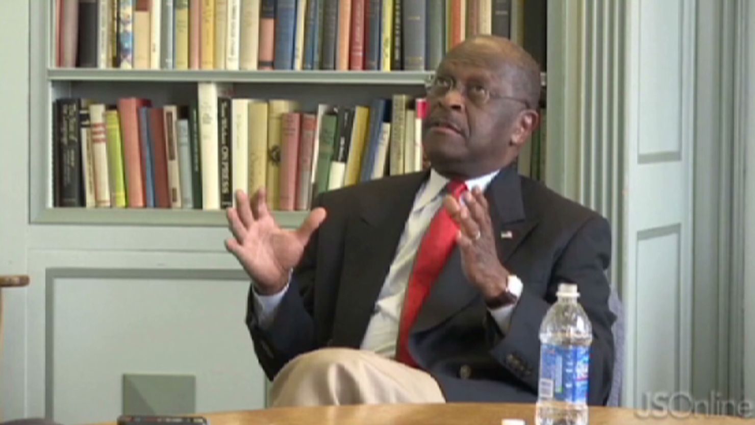 Herman Cain appeared to have difficulty responding to a question at a Milwaukee newspaper about U.S. policy on Libya.