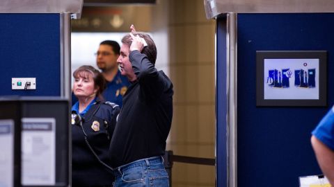 A man underdoes a full body scan before heading to his flight at Pittsburgh International Airport last year.