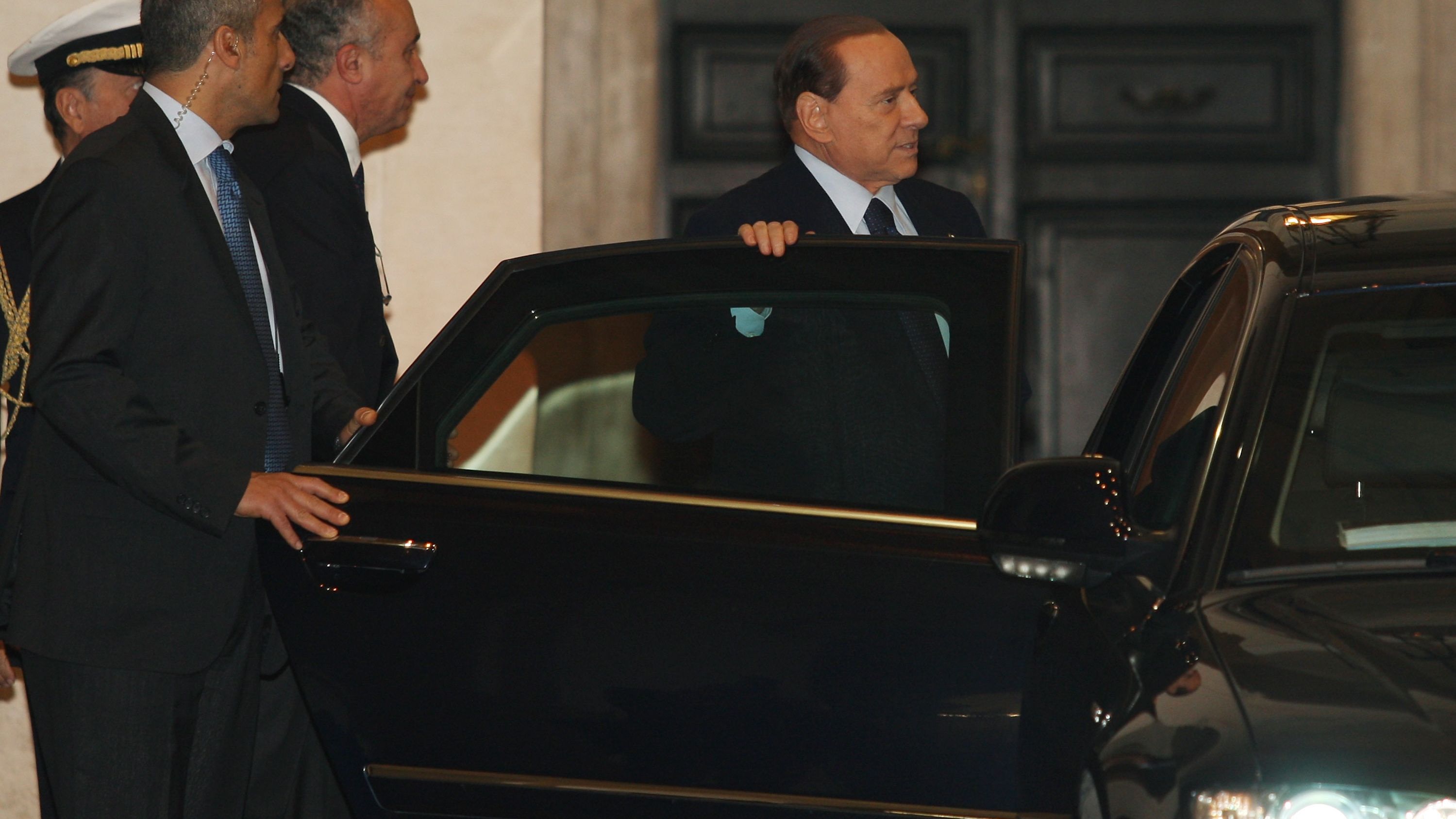 Former Italian Prime Minister Silvio Berlusconi departs Palazzo Chigi in Rome  on Wednesday.