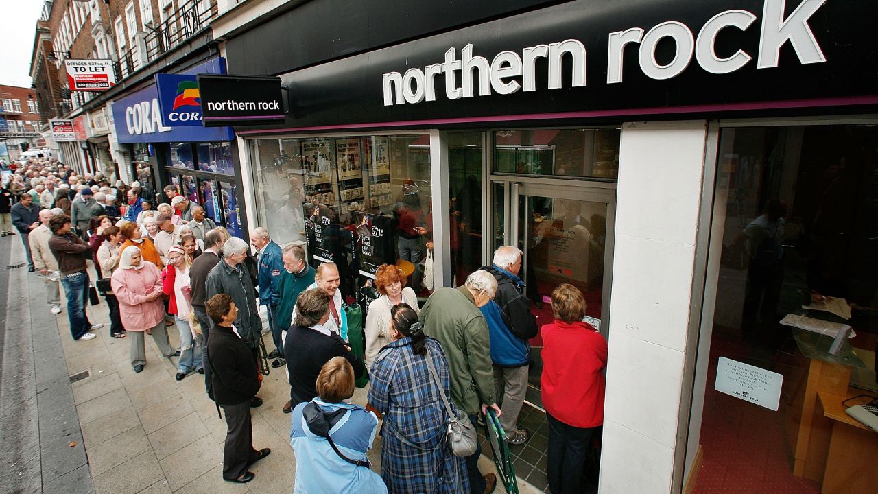 Customers queue to remove their savings from a Northern Rock branch in September 2007 in Kingston-Upon-Thames.