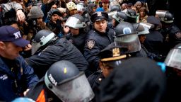 Police officers clash with Occupy Wall Street protesters in New York's Zuccotti Park on Thursday, November 17.
