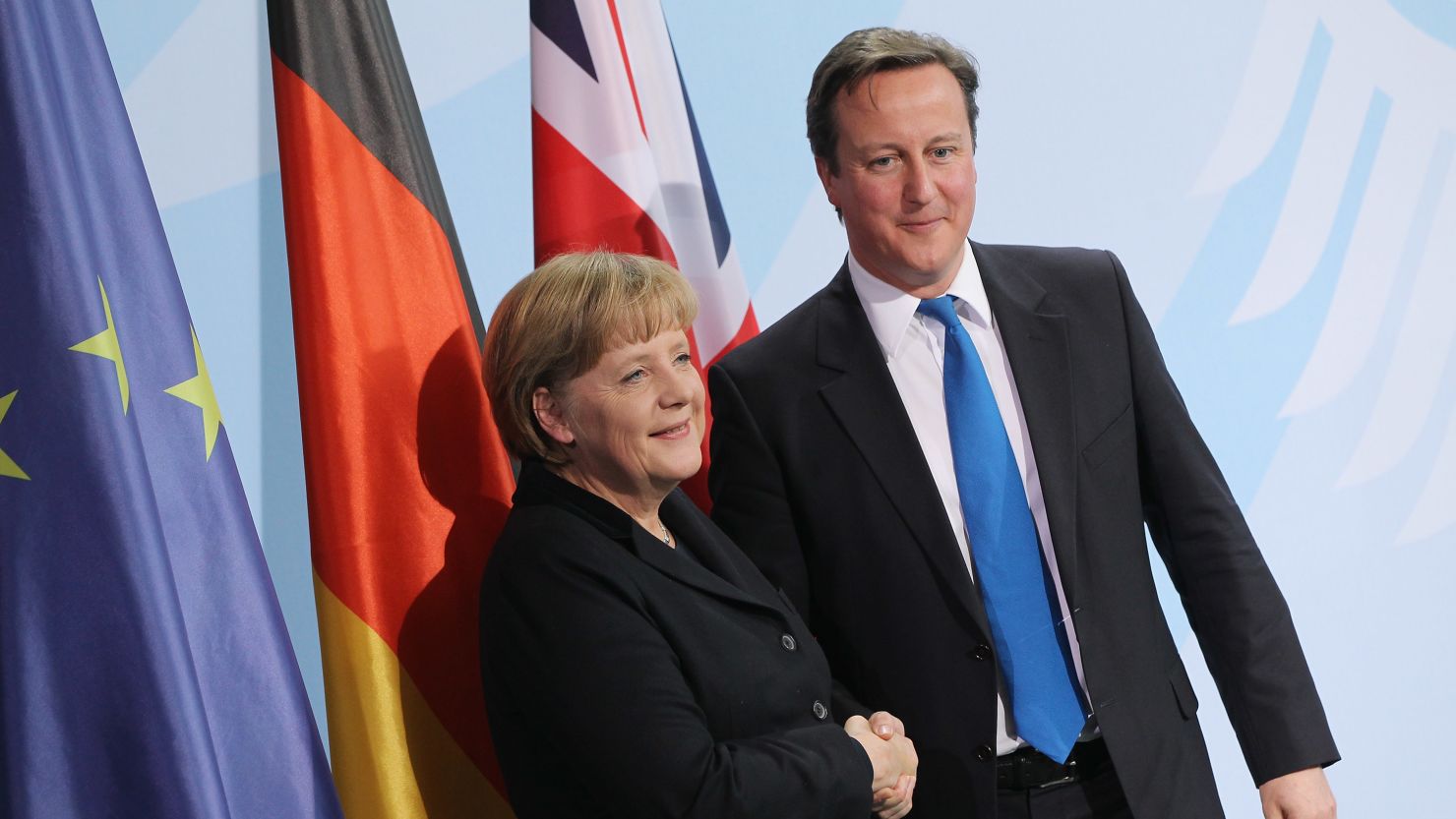 Angela Merkel and David Cameron shake hands after a press conference in Berlin on November 18, 2011.