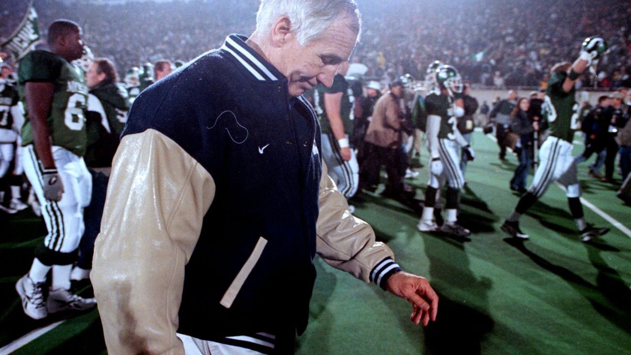 Penn State's Jerry Sandusky walks off the field after a loss to Michigan State in 1999.