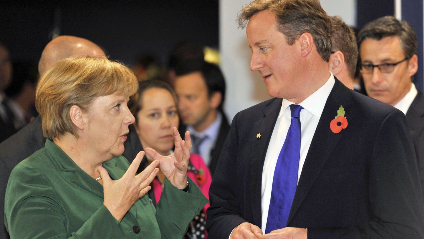 German Chancellor Angela Merkel speaks to Britain's Prime Minister David Cameron at the G20 summit in Cannes, France.
