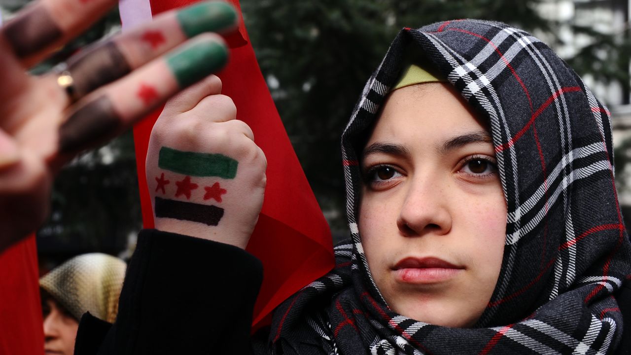 A Syrian woman living in Turkey protests against the government of Syria's President Bashar al-Assad on Friday.