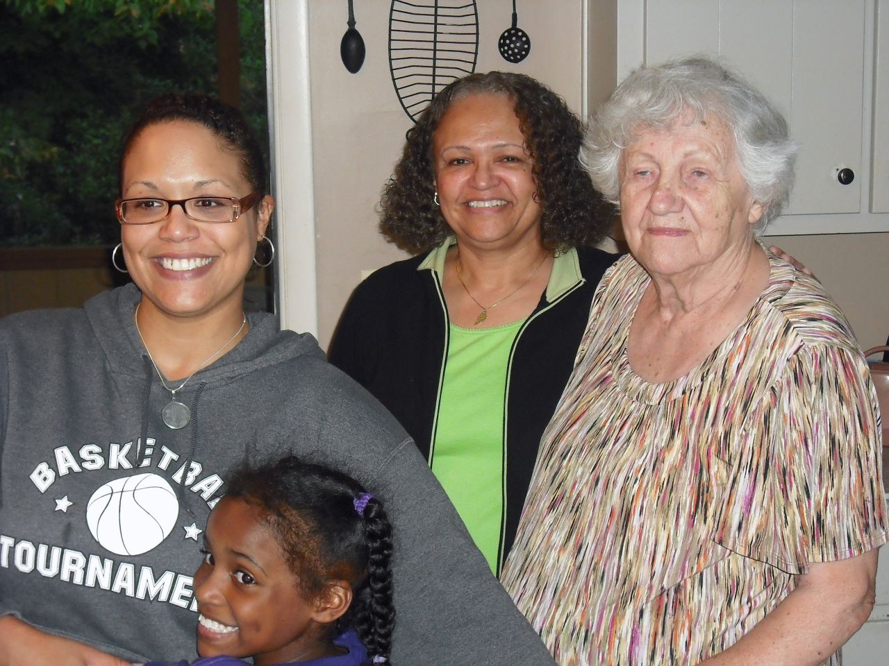 In October 2011, Cain, center, gathered her daughter, far left, mother, far right, and granddaughter for their first family portrait. "I was really happy to finally get this four-generation photo taken," Cain said.